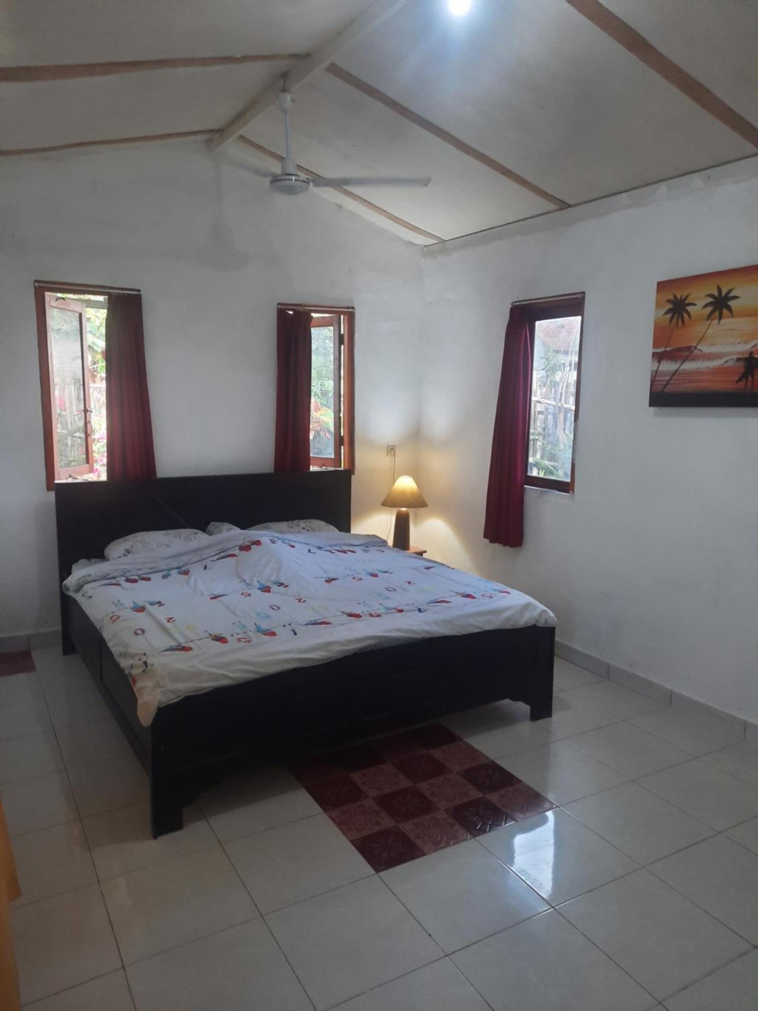 Red Beach Homestay Pasanggaran Chambre photo
